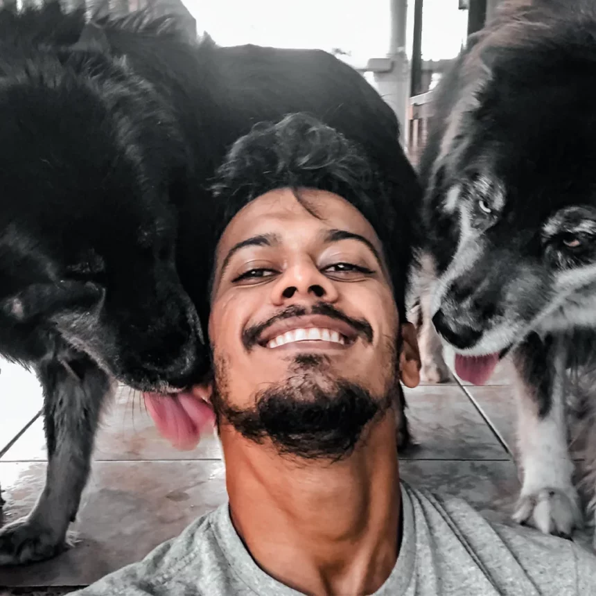 Dr. Gabriel roopnarine 1 Tmvc about us dr grabriel with two dogs
